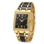 A rectangular women's watch with a gold-tone case, black dial, and a two-tone black and gold link bracelet. The bezel is embellished with small clear crystals, and the brand name 'WINDOR' is visible on the dial.