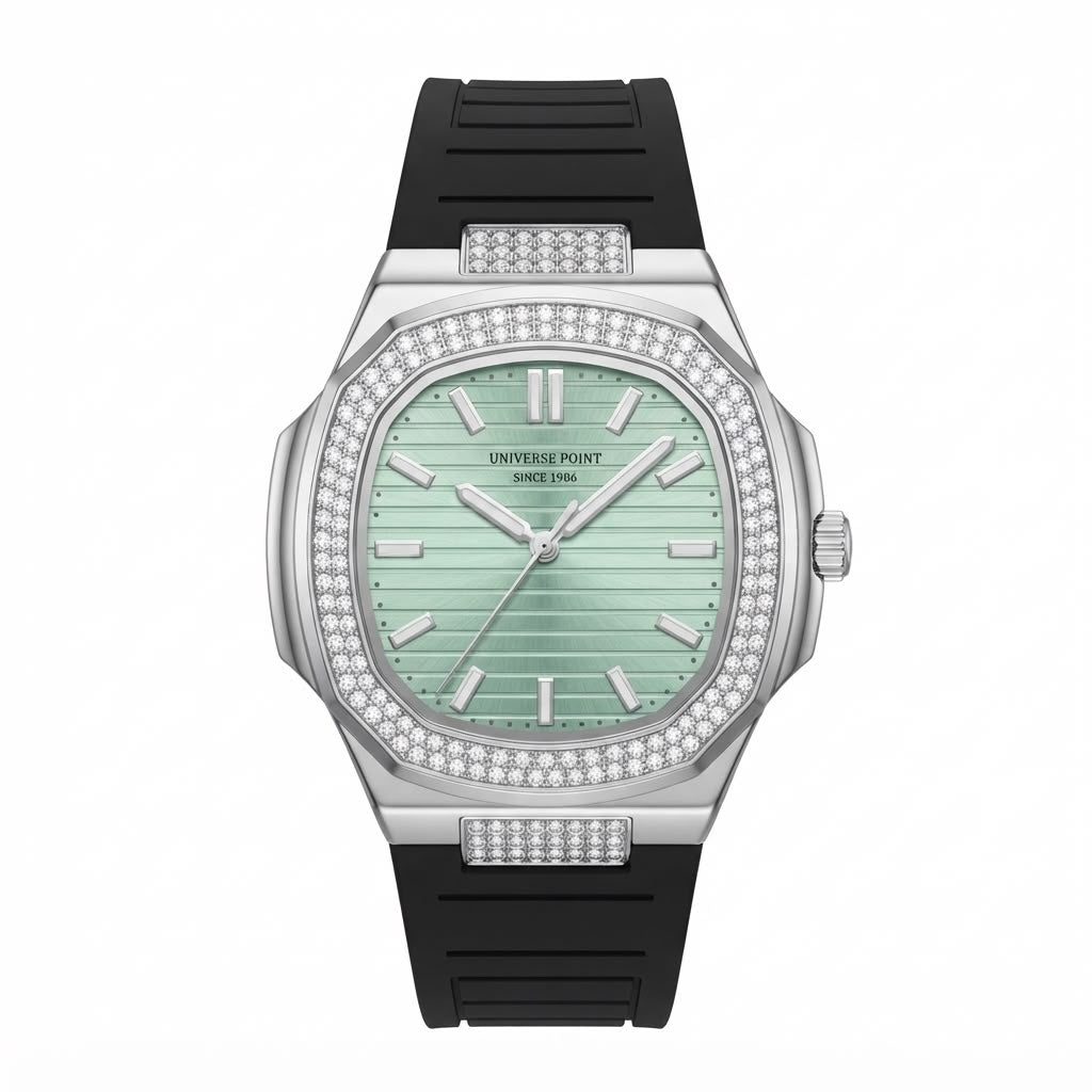 A luxury wristwatch by Universe Point, featuring a silver-toned octagonal case encrusted with diamonds, a light mint green dial, and a black textured rubber strap, shown against a plain white background.