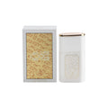 A white cylindrical perfume bottle with a gold cap stands next to its matching white box, which features gold Arabic calligraphy, on a plain white background.