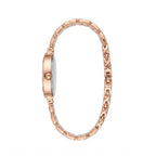 Rose gold women's watch with a multi-link chain bracelet and a round case, shown from the side on a white background.