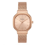 A rose gold analog watch with an octagonal bezel, matching rose gold dial, and a mesh metal strap, shown against a plain white background. The brand name 'Discovery' is printed on the dial.