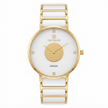 A women's analog watch by Time Square with a white ceramic link bracelet, a white dial, and a gold-tone case and hands. The dial features a central gold circle and small crystal hour markers.