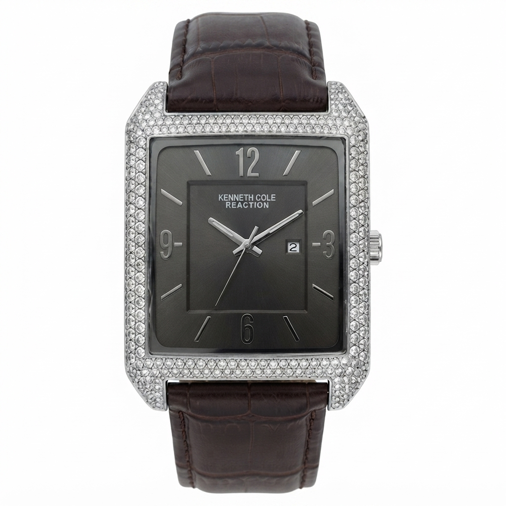 Kenneth Cole Reaction men's watch featuring a square silver-tone case encrusted with clear crystals, a dark charcoal gray dial, and a dark brown alligator leather strap, shown on a white background.