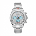 A luxury wristwatch with a silver-tone stainless steel case and bracelet, heavily embellished with clear crystals. The dial is also crystal-covered with light blue subdials and blue hands, and features red text accents including 'Henry Dato' and '1904L'.