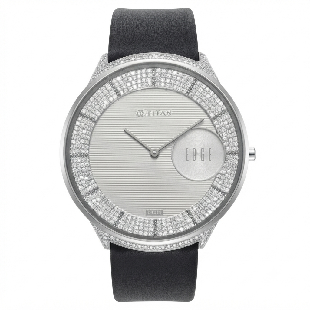 A luxury watch by M.TITAN, featuring a round silver-tone case encrusted with clear crystals, a silver-toned textured dial with a circular day/date window, and a black leather strap.