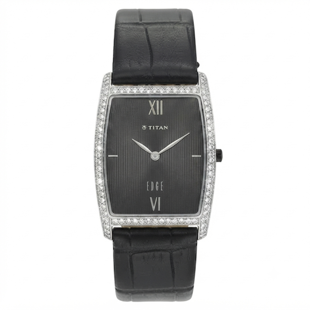 A rectangular Titan watch with a black dial, Roman numeral hour markers, silver-tone hands, and a bezel set with small clear stones, paired with a black alligator leather strap on a white background.