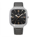 A LIDOR quartz watch with a black dial, a silver-tone case encrusted with clear rhinestones, and a dark gray leather strap, shown against a plain white background.