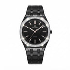 A black Avvari watch with a black dial, black metal link bracelet, and a bezel and bracelet embellished with rows of sparkling clear stones, shown on a white background with decorative light flare effects.