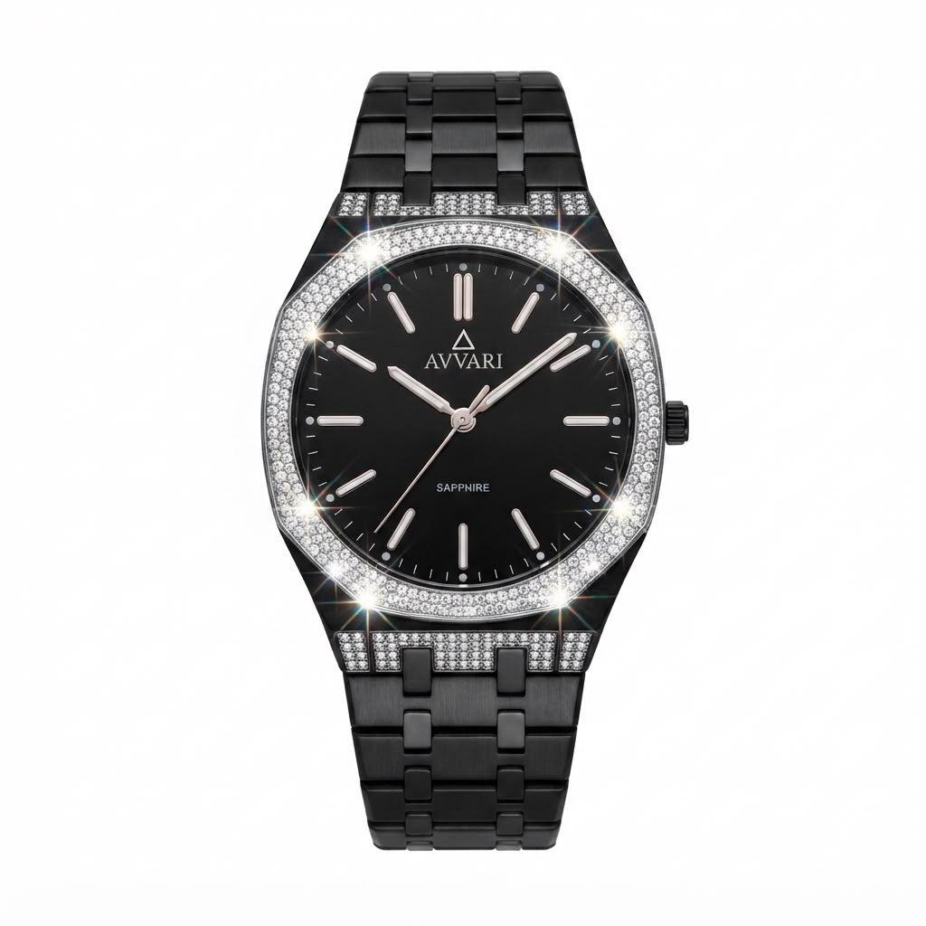 A black Avvari watch with a black dial, black metal link bracelet, and a bezel and bracelet embellished with rows of sparkling clear stones, shown on a white background with decorative light flare effects.