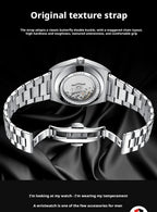 A silver stainless steel wristwatch with a transparent back and textured strap, displayed on a black satin fabric background with promotional text overlays.