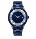 A women's analog watch with a dark blue metal bracelet and dial, featuring a bezel encrusted with clear rhinestones. The brand name 'TITAN' is printed on the dial.