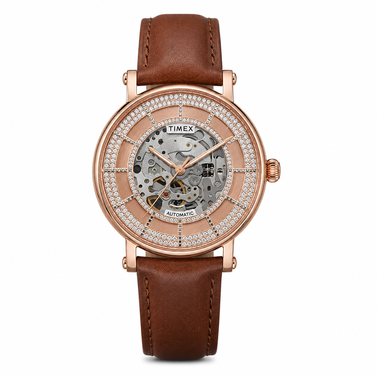 A Timex women's automatic skeleton watch with a brown leather strap, rose gold case, and a bezel set with clear crystals, shown on a white background.