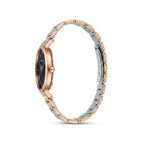 A two-tone stainless steel and rose gold watch band with a matching round dial, shown from a side profile view on a white background.