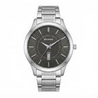 A stainless steel wrist watch with a dark gray sunburst dial, silver-tone metal case, and matching metal link bracelet, featuring a date window at the 3 o'clock position. The brand name 'Discovery' is printed on the dial.