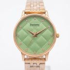 A women's analog watch with a light green quilted dial, rose gold-tone case and bracelet, and crystal hour markers. The brand name 'Discovery' is printed on the dial.